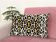 Ikat cushion in panther velvet