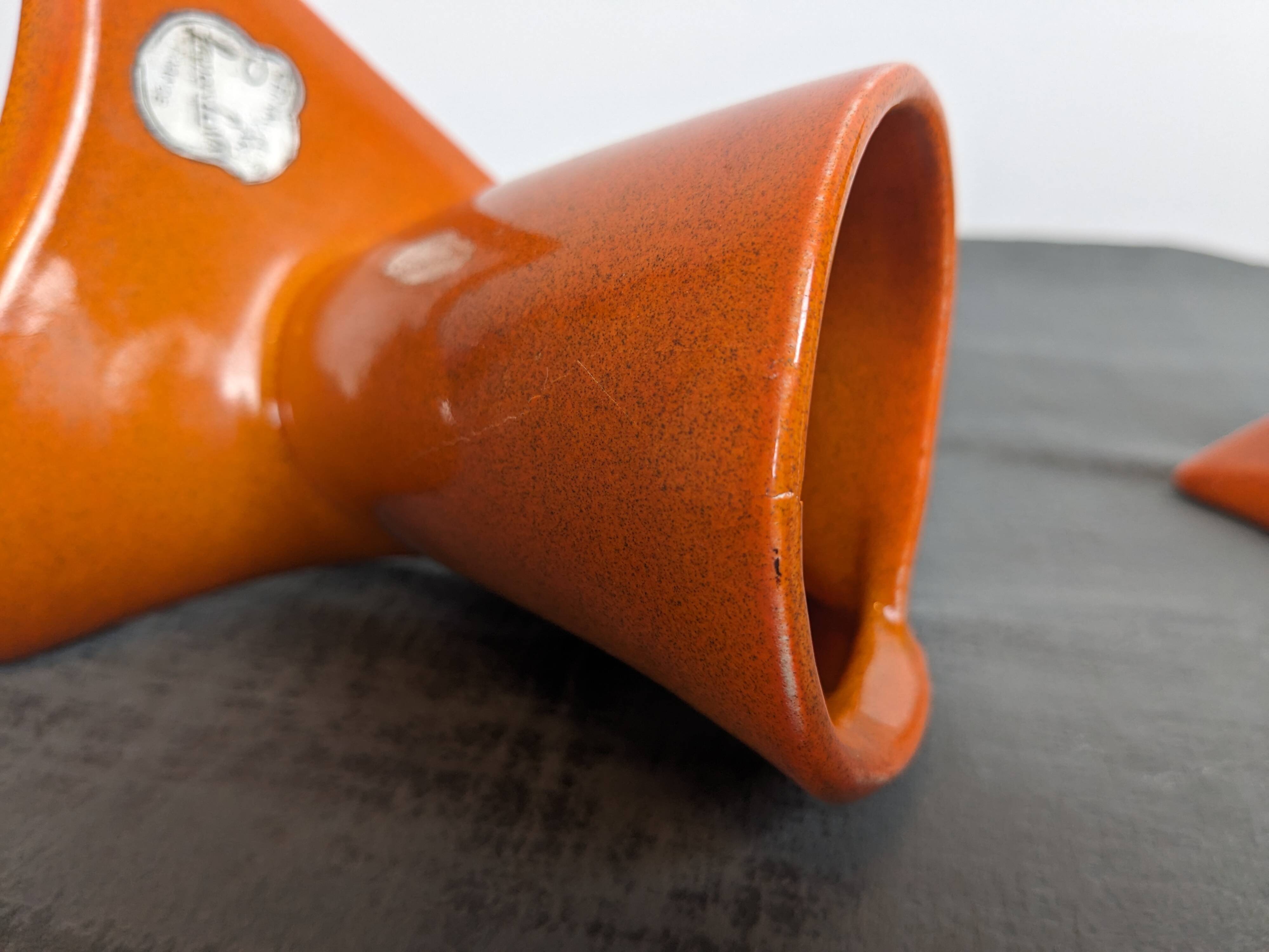 Pair of orange ceramic flower girls by Francis Lovas
