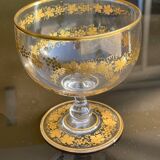 Glass cup decorated with golden vine decoration