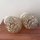 Paire d’appliques murales globes en verre doré