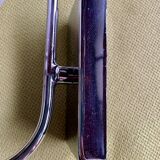 Pair of chrome metal wall lights with white glass globe.