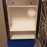 Vintage wax metal medicine cabinet.