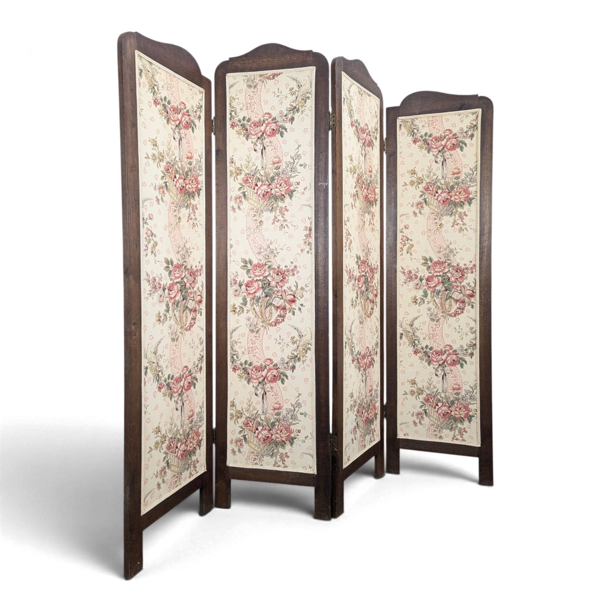Four-panel oak screen adorned with floral upholstery from the 1930s.