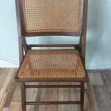Folding chair caned from the 70s