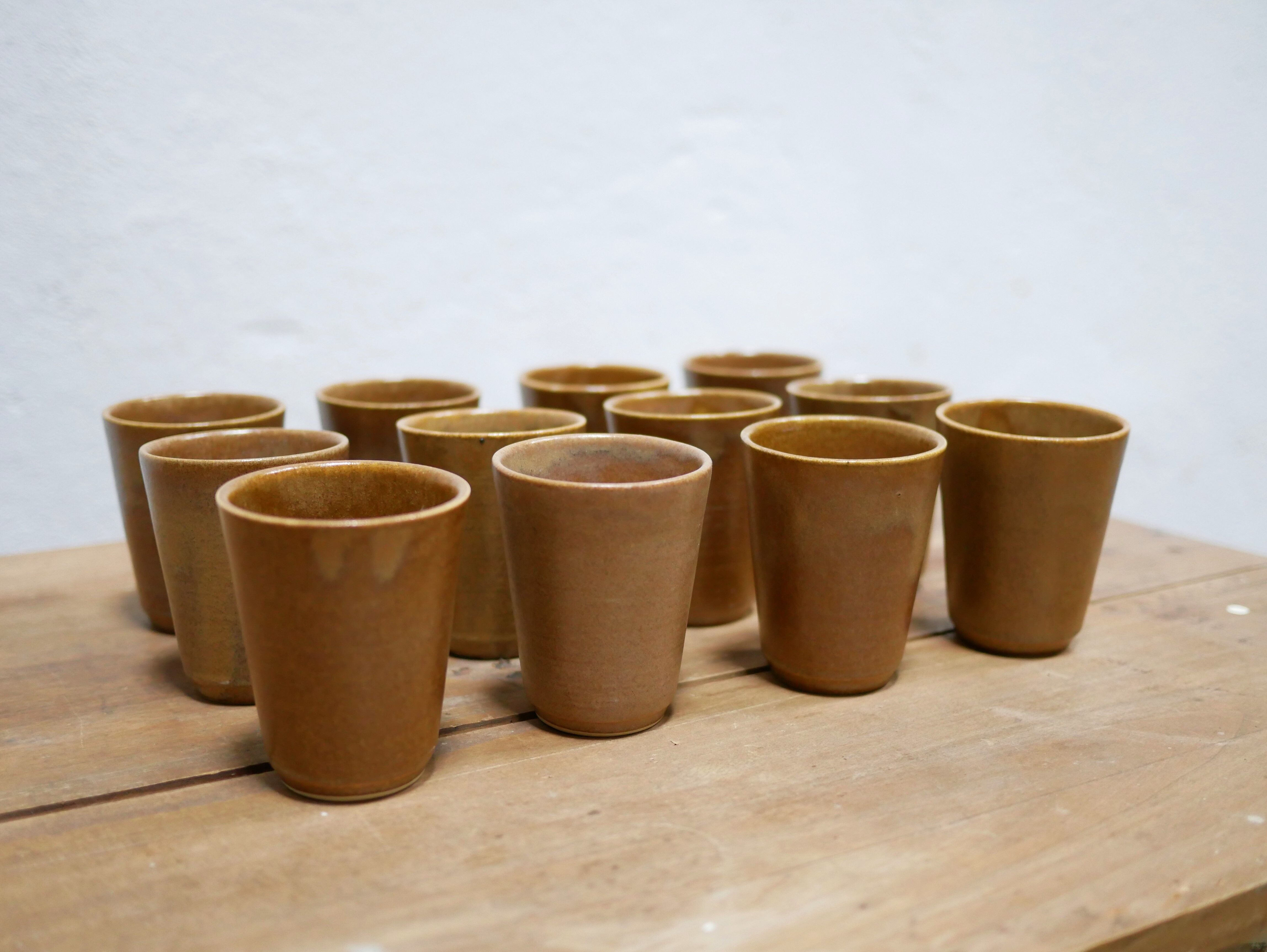 Series of 4 vintage stoneware glasses by the manufacture of Digoin, France