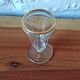 Antique footed liqueur glasses with gold trim from the early 20th century.