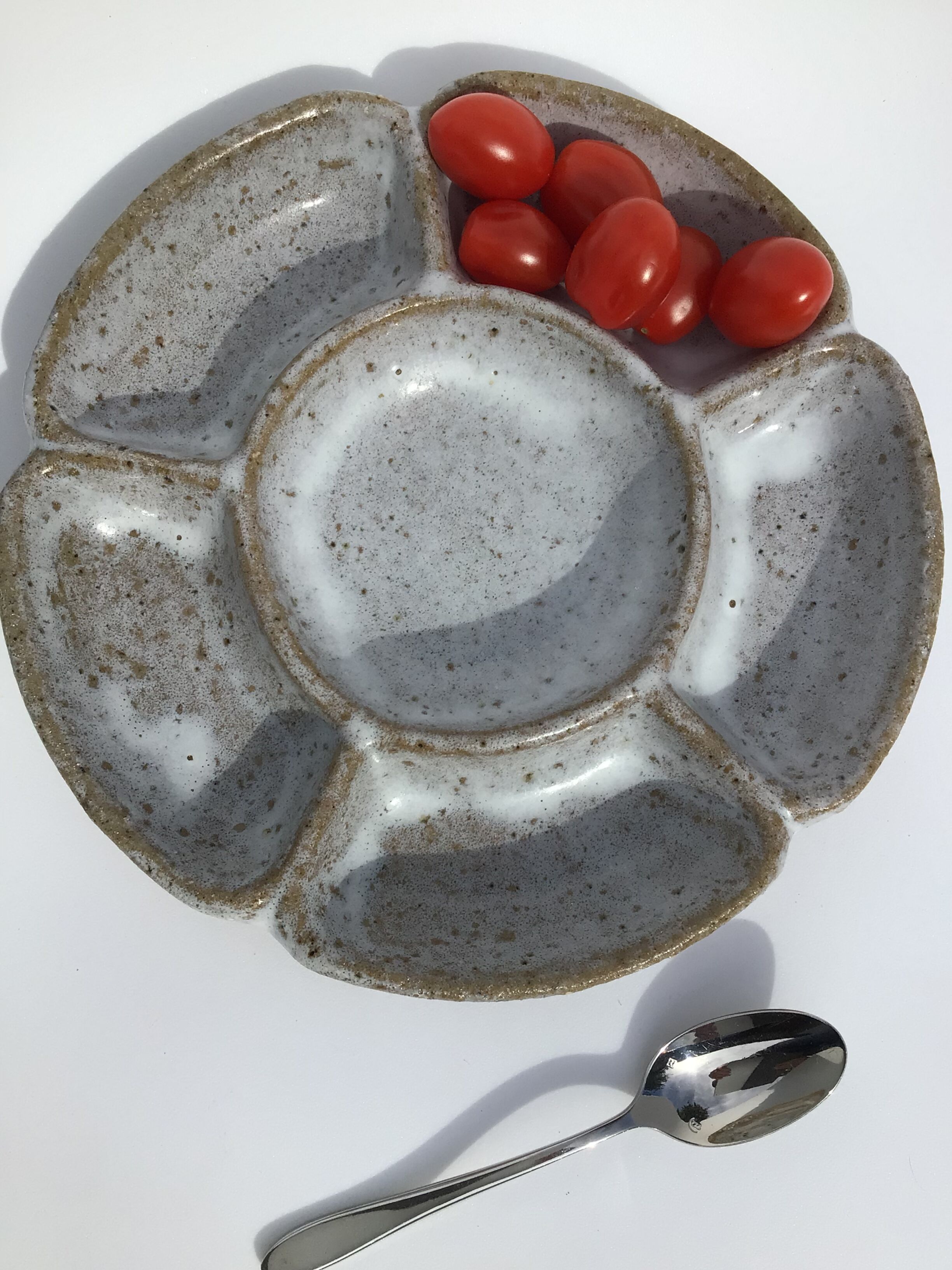 4 White compartmentalized handmade stoneware plates