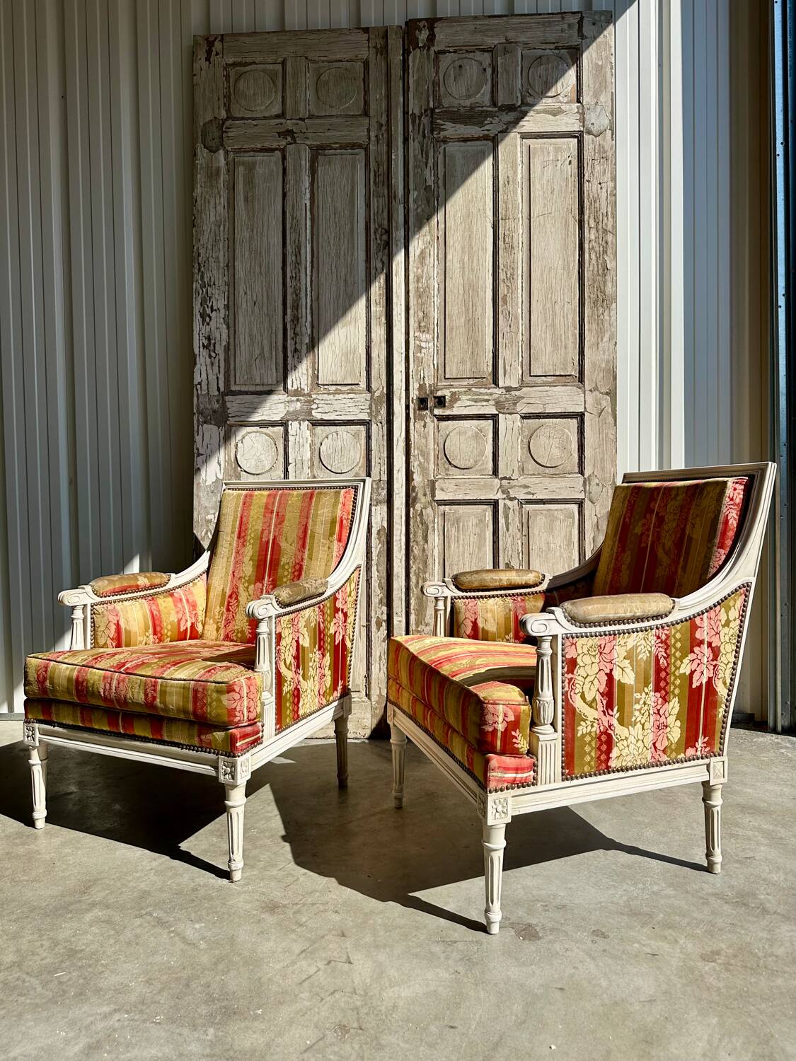 Pair of Louis XVI lacquered bergere chairs circa 1950
