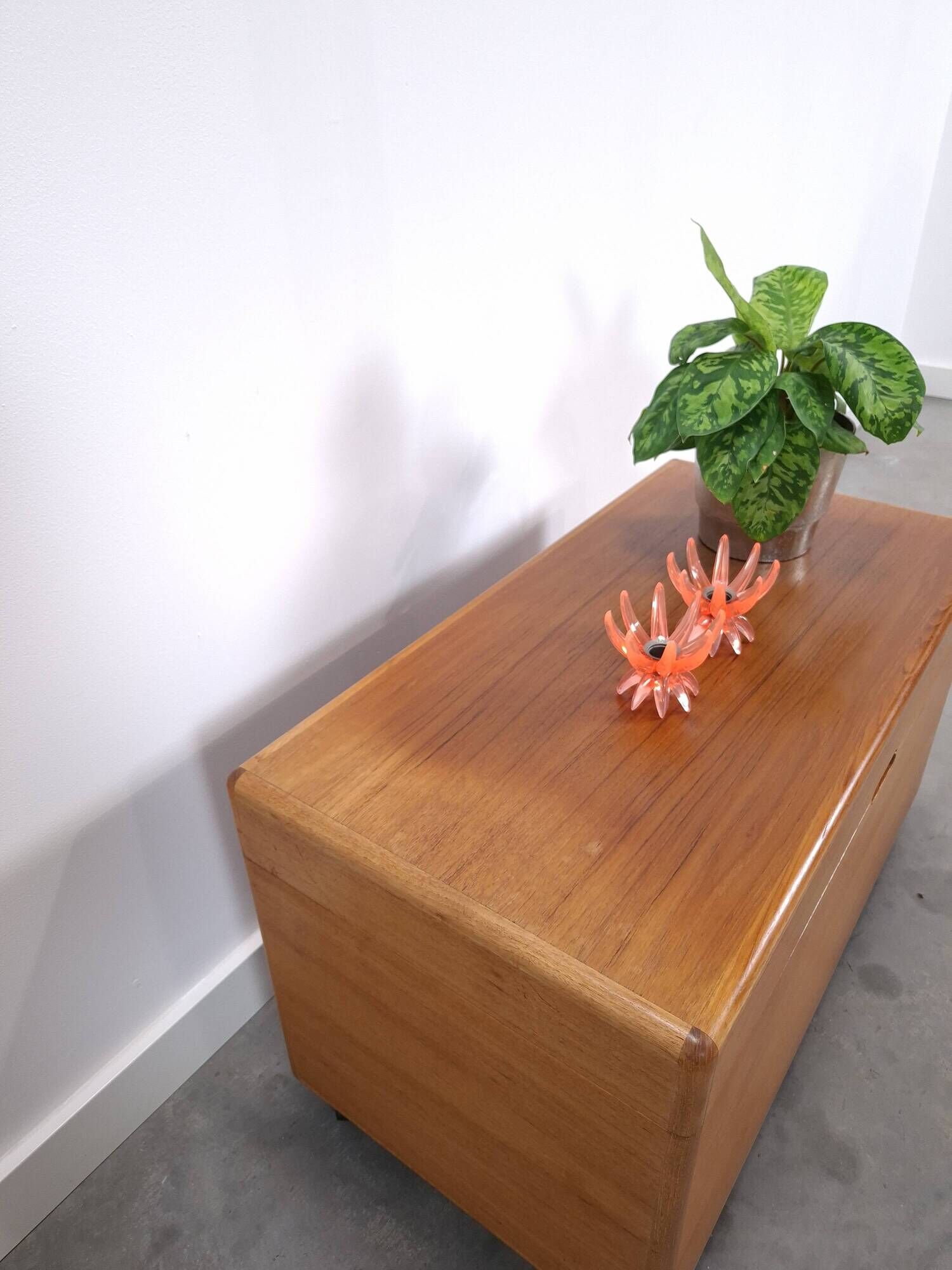 Vintage teak Danish chest with a lid on wheels, toy chest.