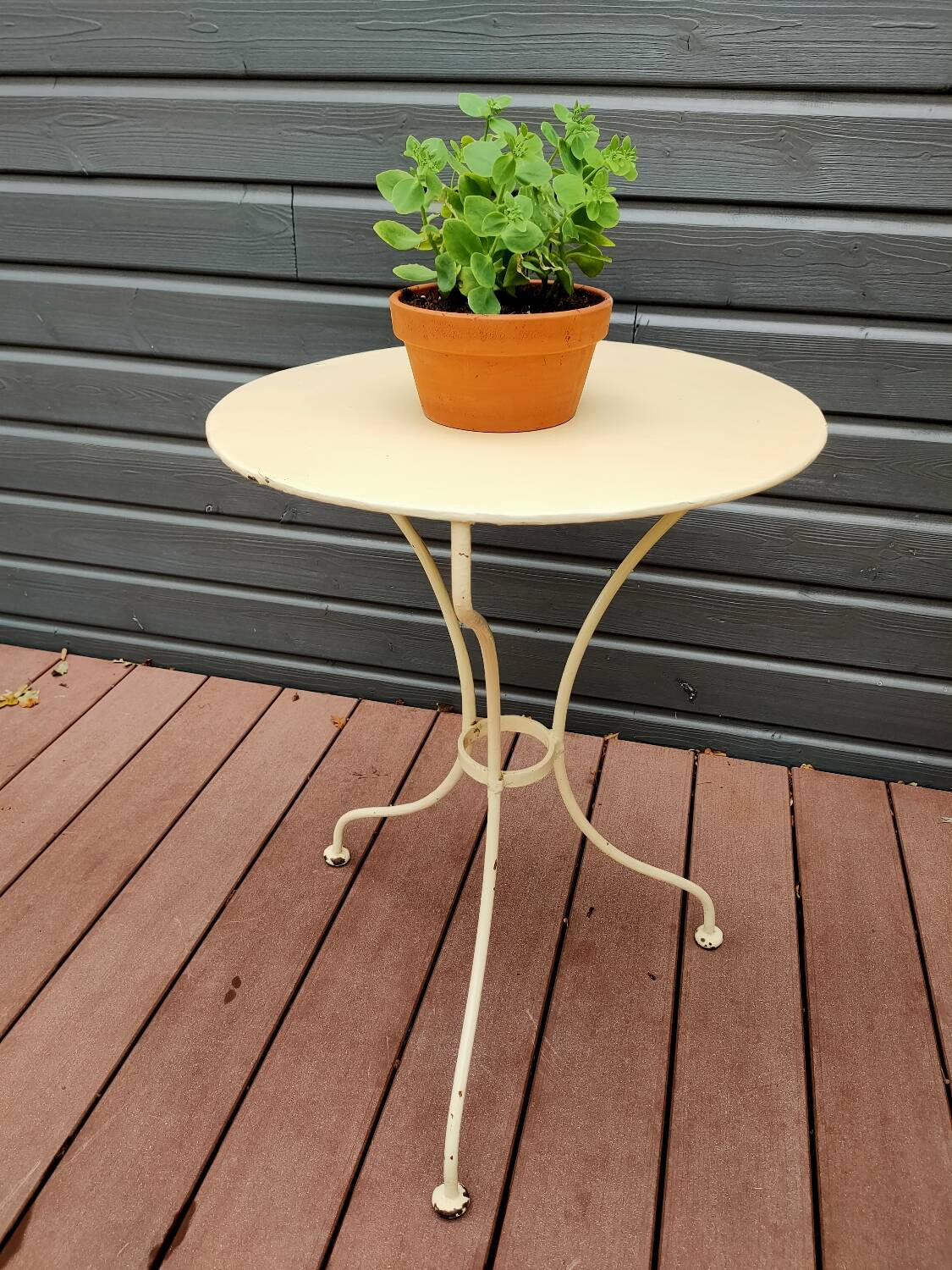 Old white iron garden table