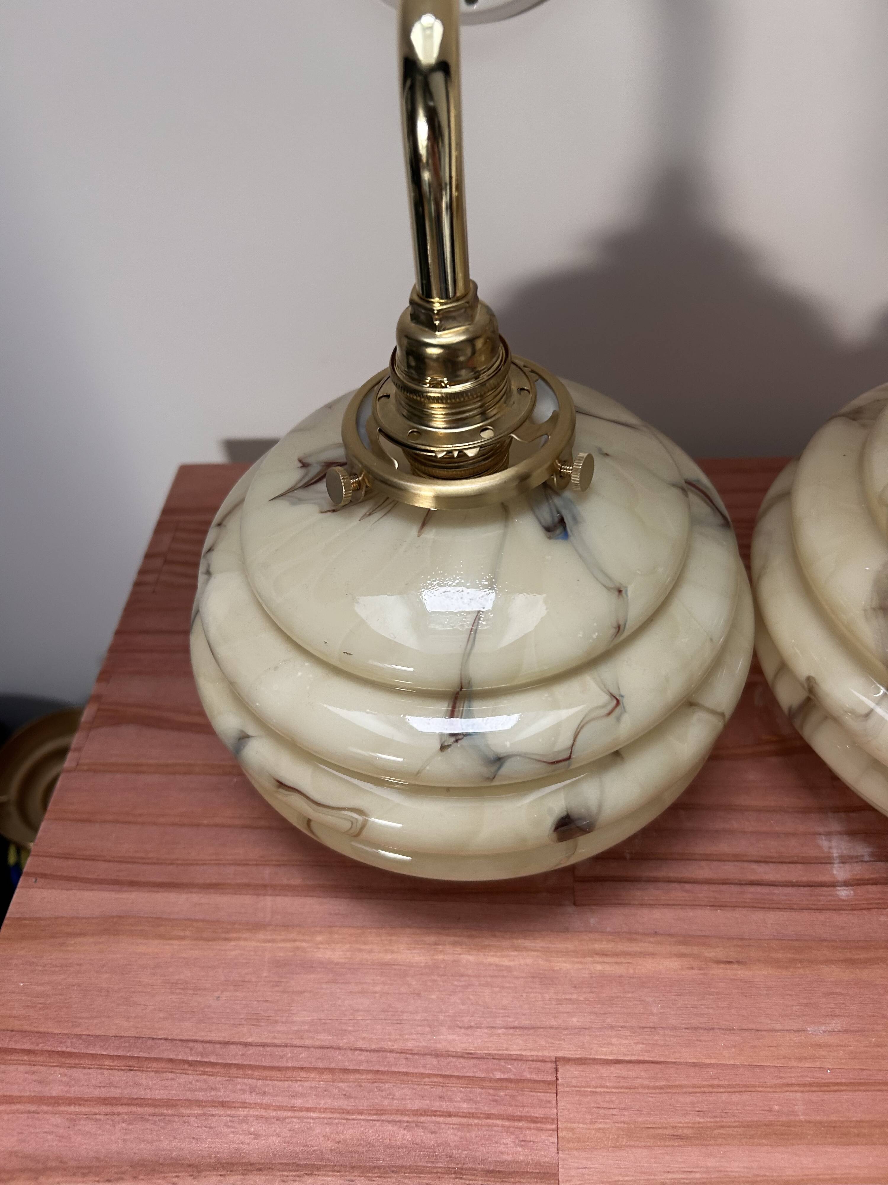 Pair of vintage marbled opaline globe wall lights