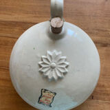 Beige sandstone hot water bottle