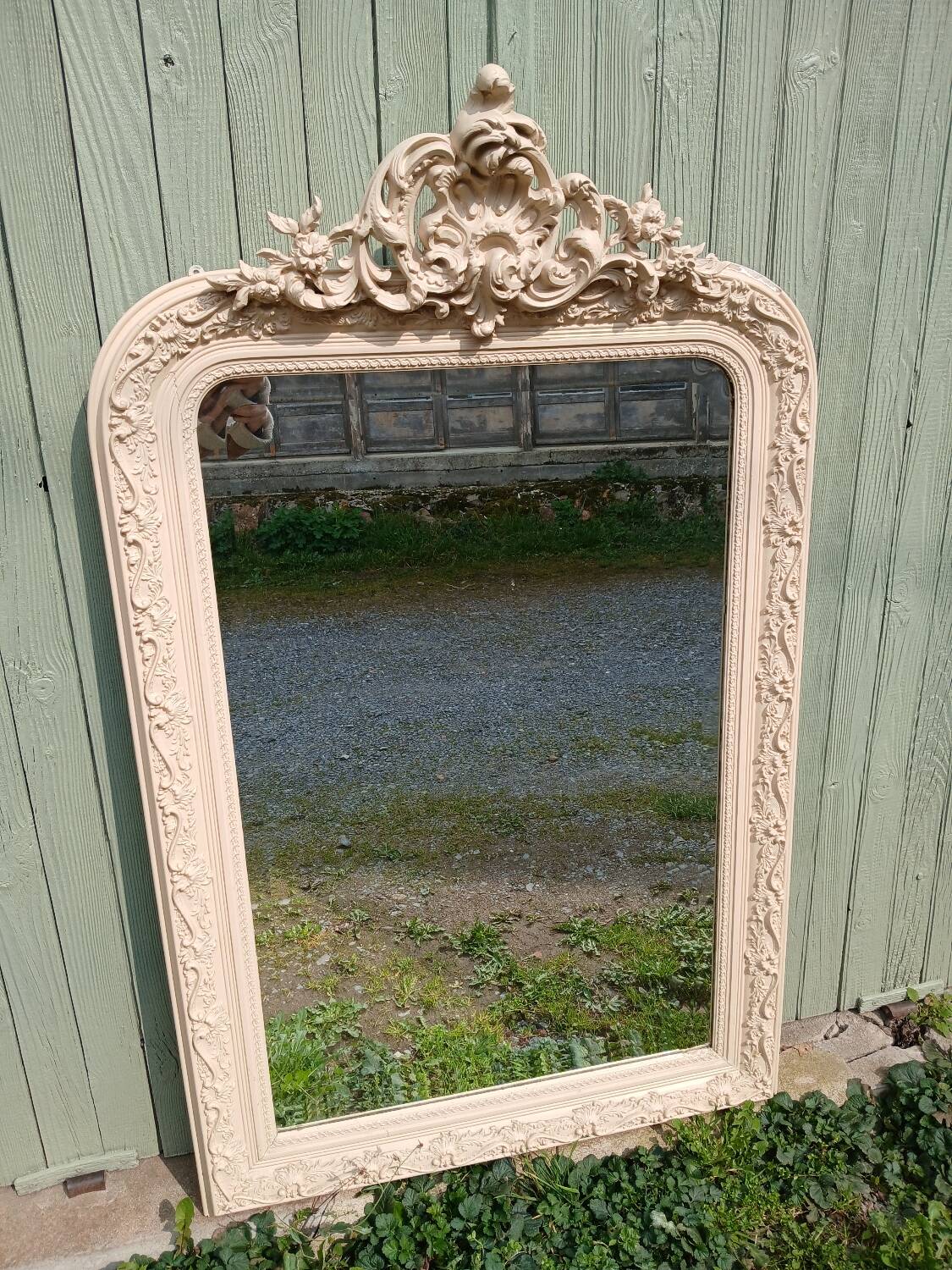 Antique carved wooden mirror