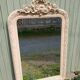 Antique carved wooden mirror