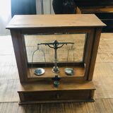 Apothecary trebuchet scale in wooden chest