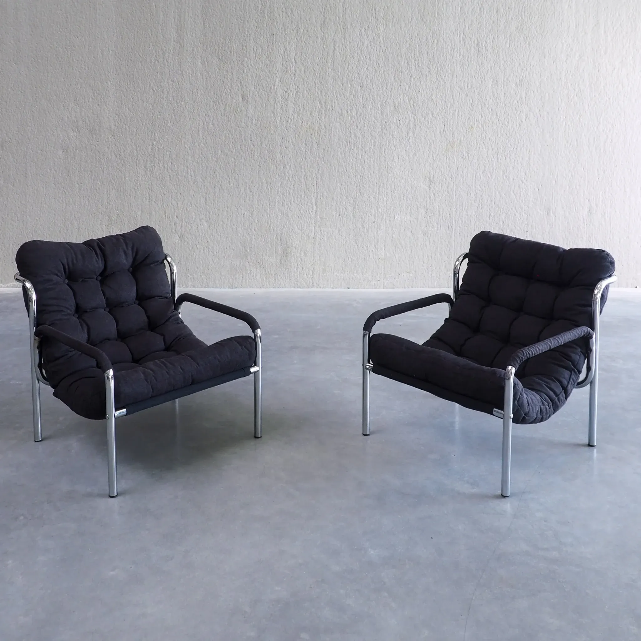 Pair of mid-century modern tubular lounge chairs