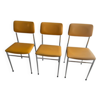 LM vintage chrome and orange/mustard yellow faux leather chairs