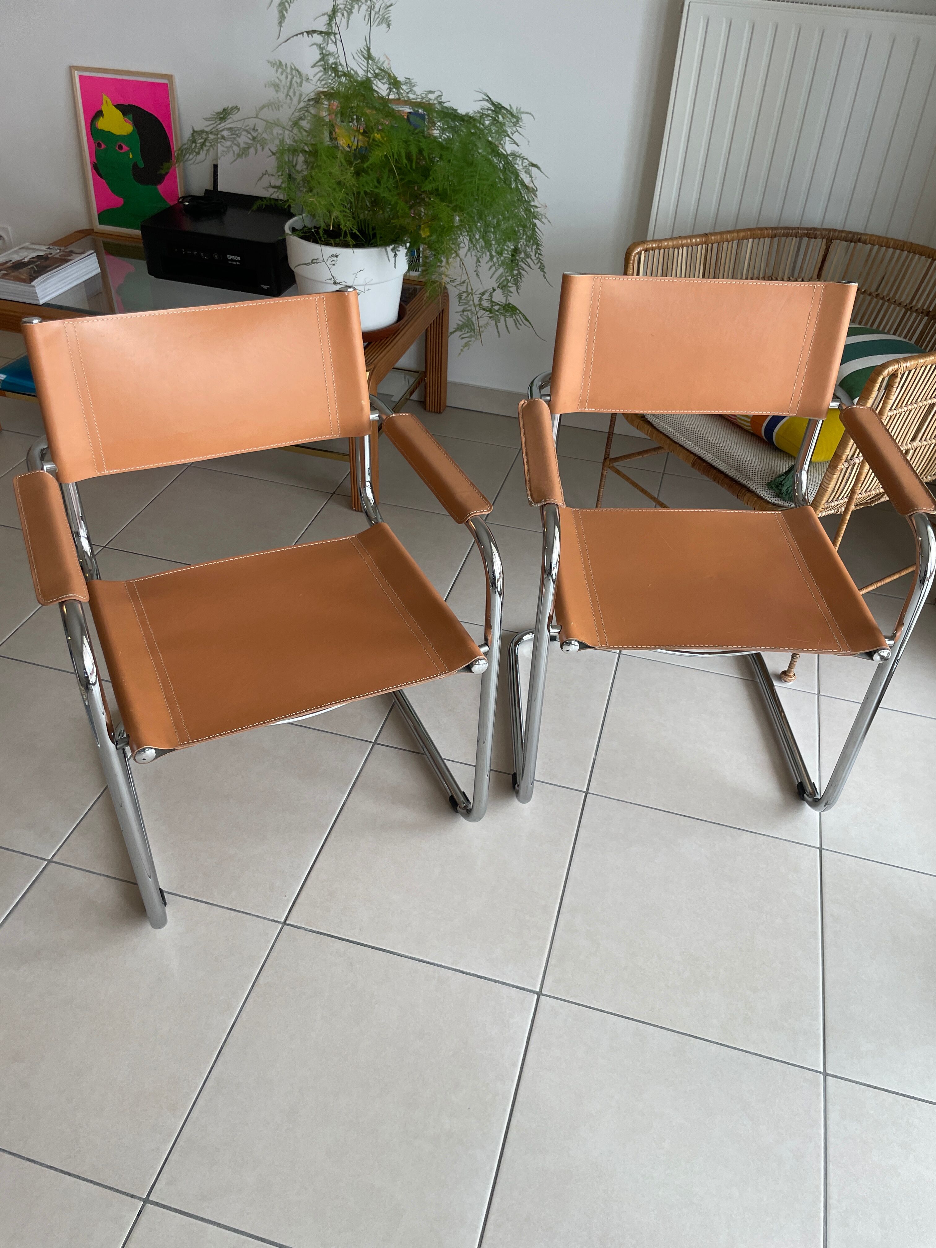Stainless steel & leather armchairs