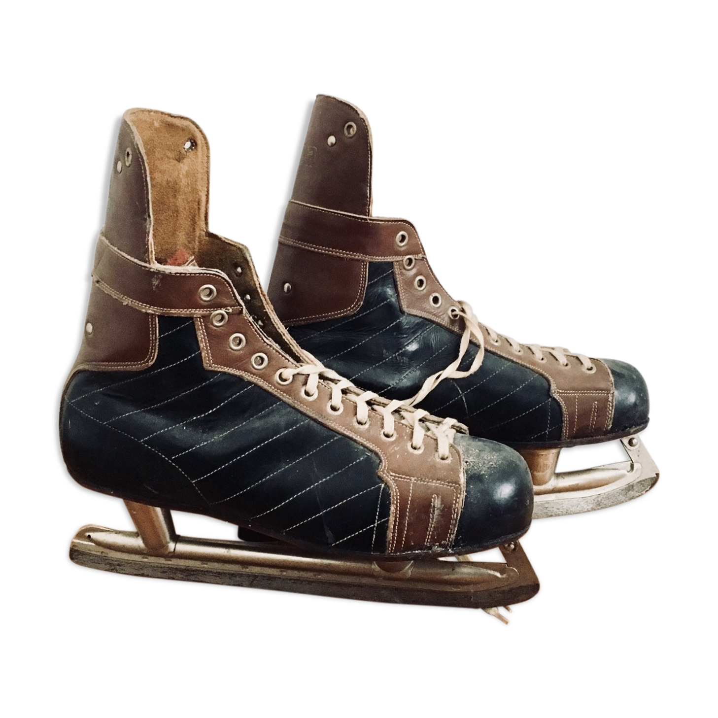 Pair of vintage lutra ice skates