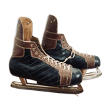 Pair of vintage lutra ice skates