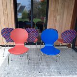 Blue and terracotta ant chairs with eye pattern