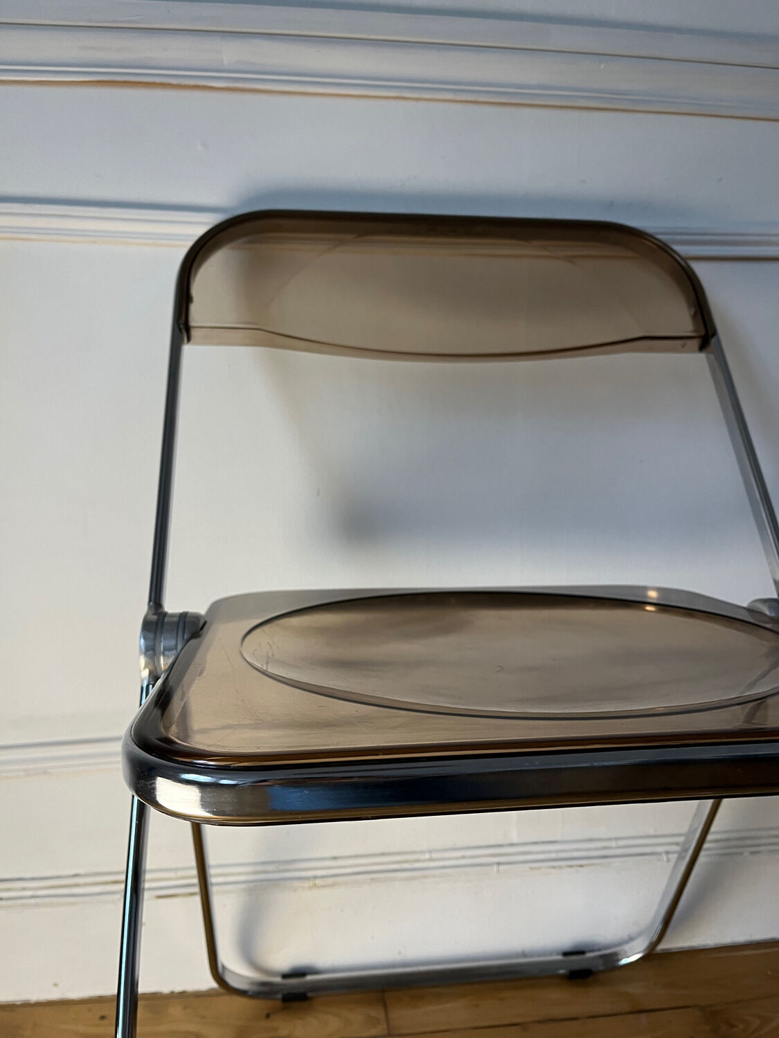 Plia folding chair by Giancarlo Piretti Castelli