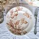 Antique iron earthenware plates accompanied by dishes