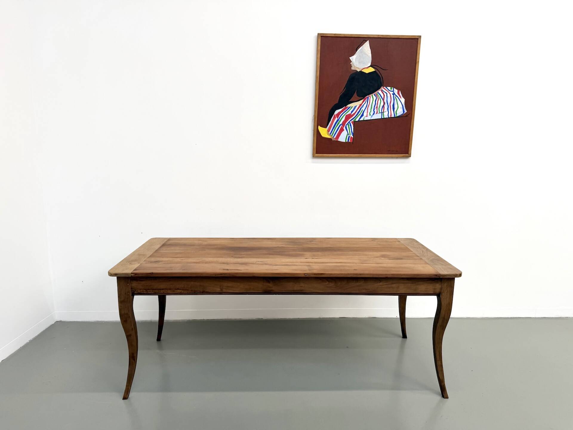 Farm table in solid cherry — Saber legs, Circa 1880