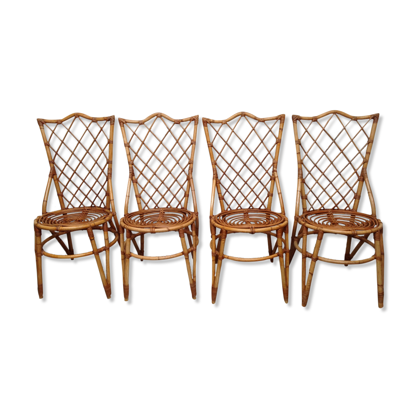 Rattan chairs by Louis Sognot