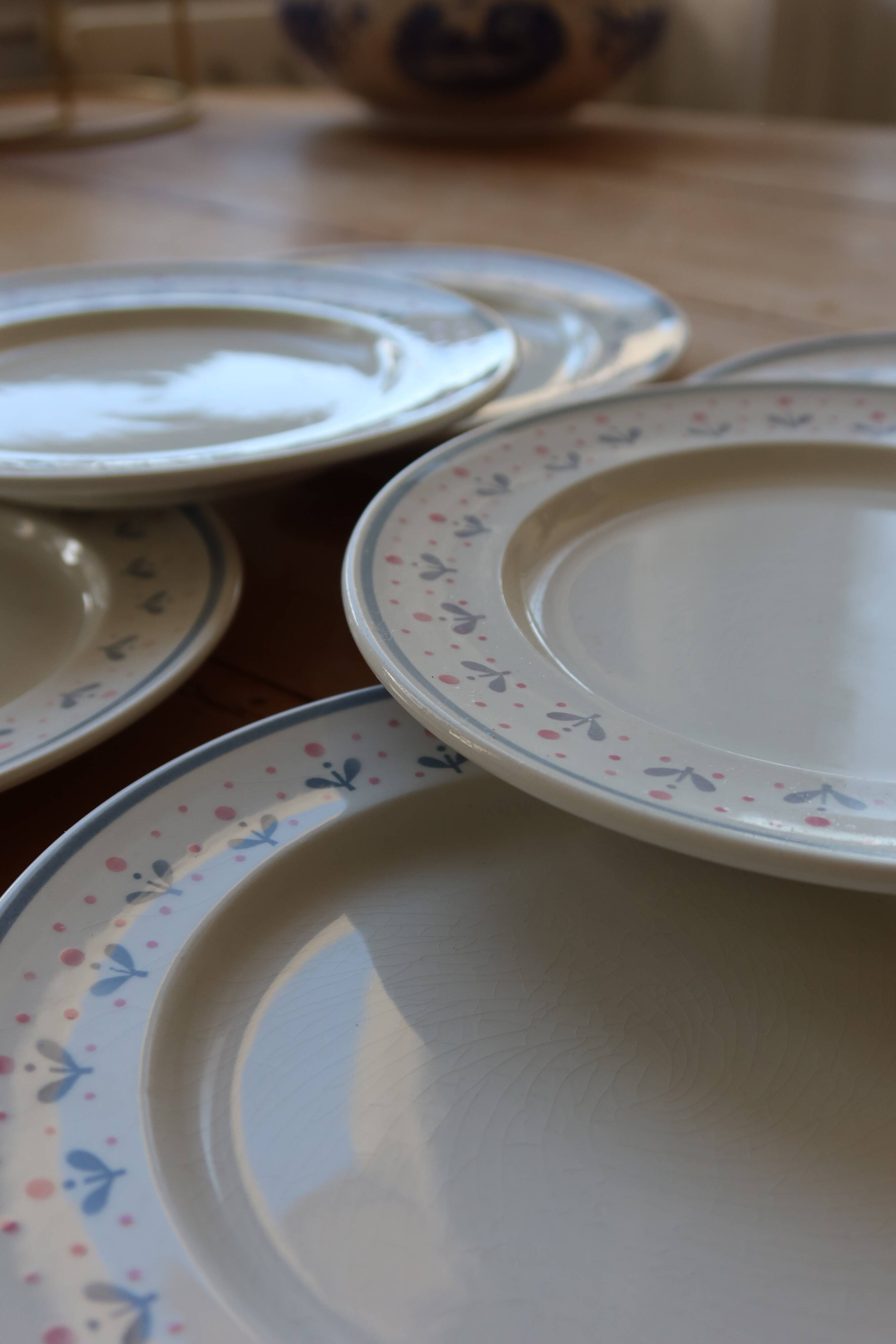 6 vintage dessert plates stamped Longchamp with floral border