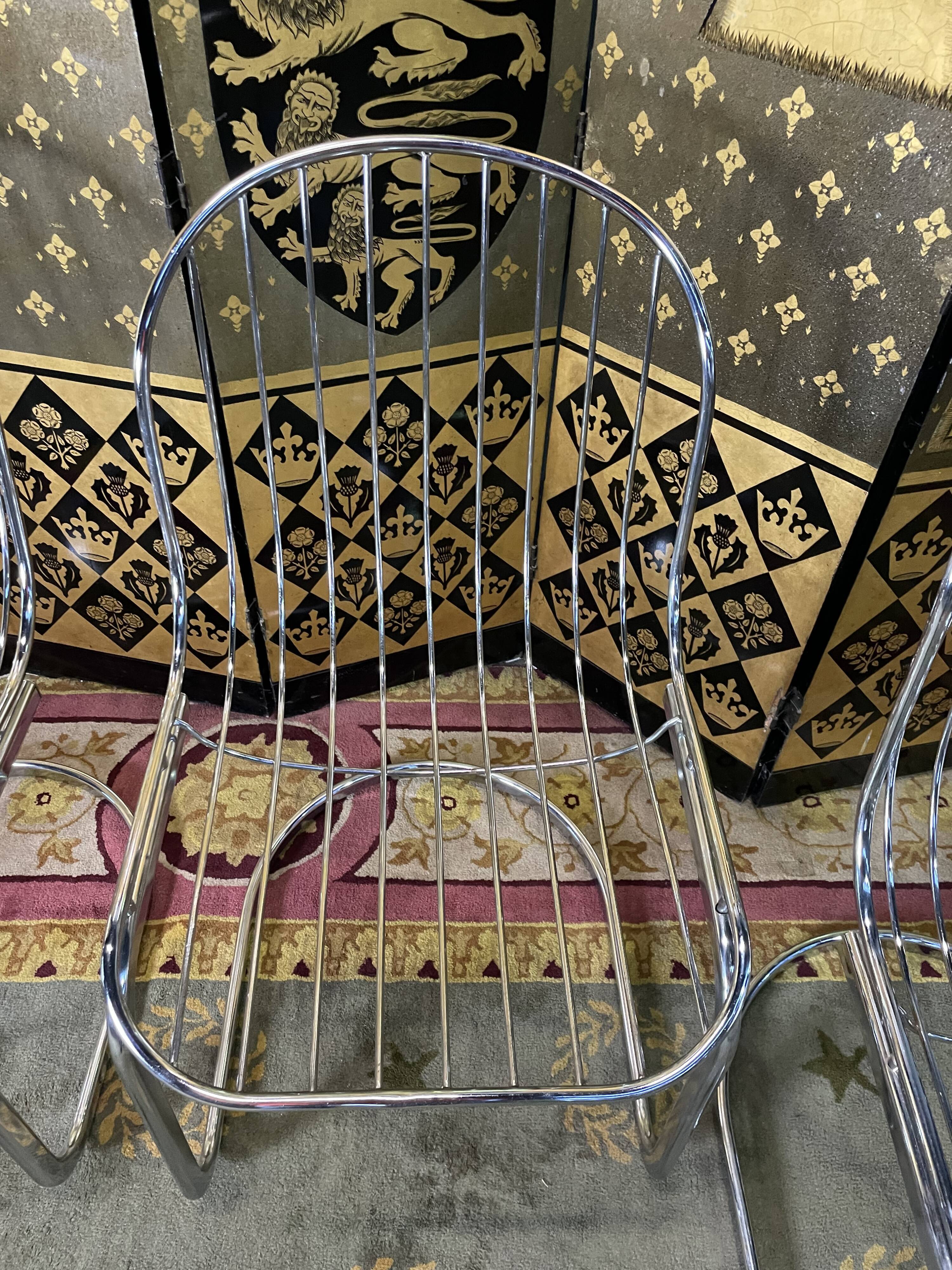 Suite of 4 chrome metal chairs 1970