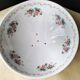 Fruit drainer and its porcelain dish by Pillivuyt.