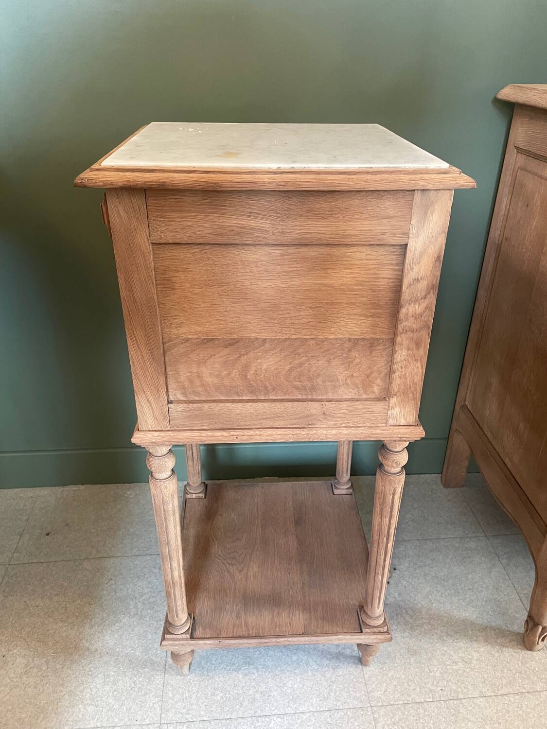 Sandblasted bedside table with white marble