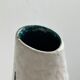 Ceramic pitcher with hand painted floral pattern
