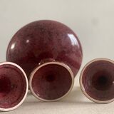 Bougeoirs et coupe en céramique mouchetée .