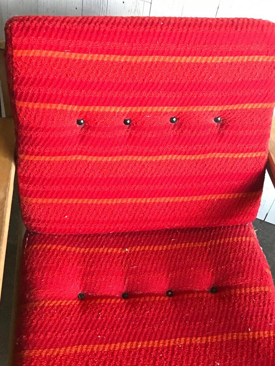 Set of mid-century red upholstered armchairs, 1960s Danish style.