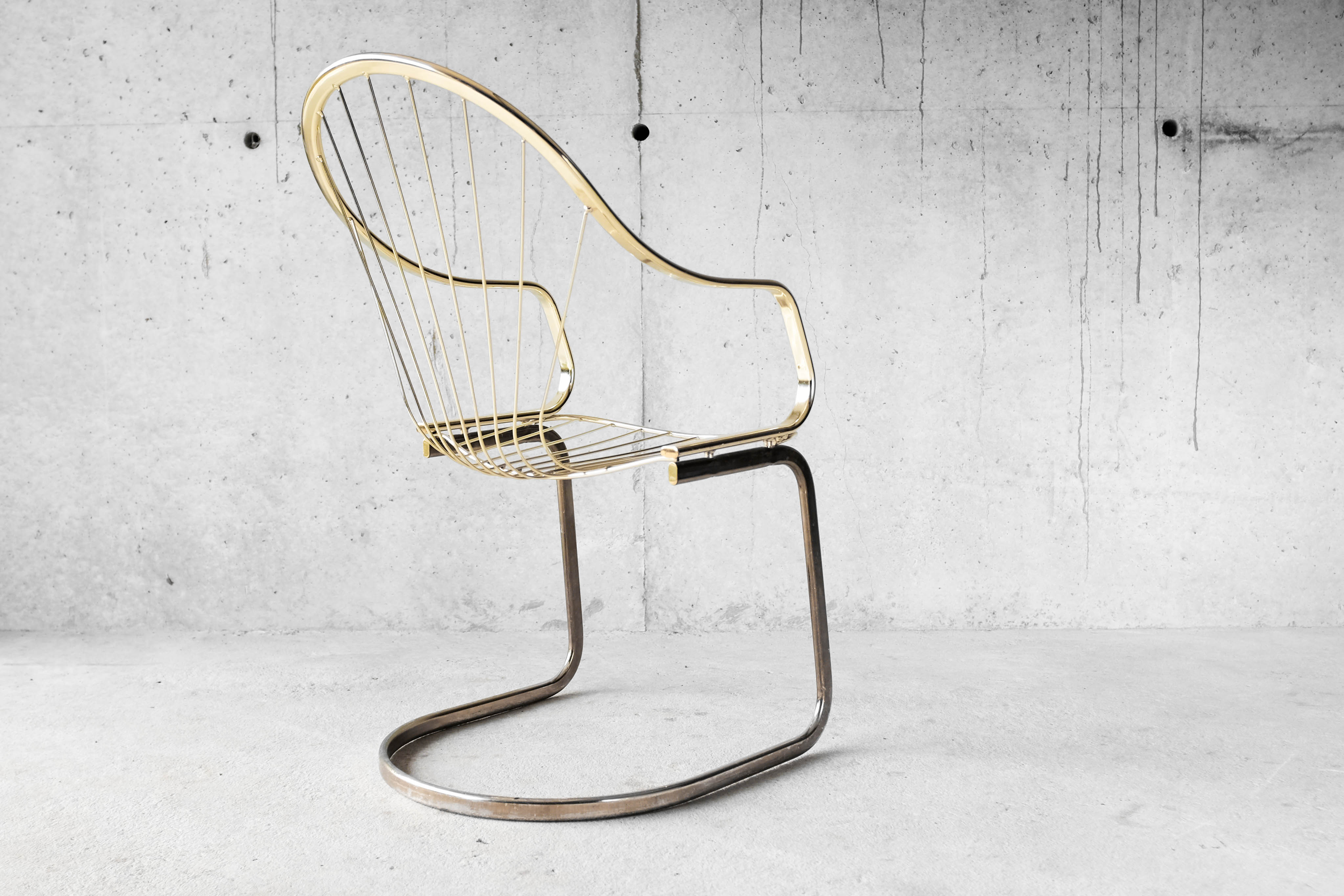 Golden metal armchair 70s