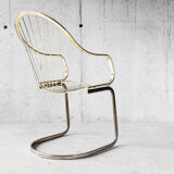 Golden metal armchair 70s
