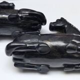 Black marble bookends with lying horses