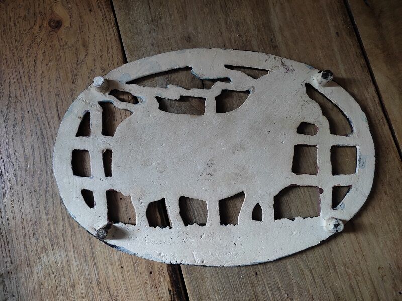 Patinated metal table mat