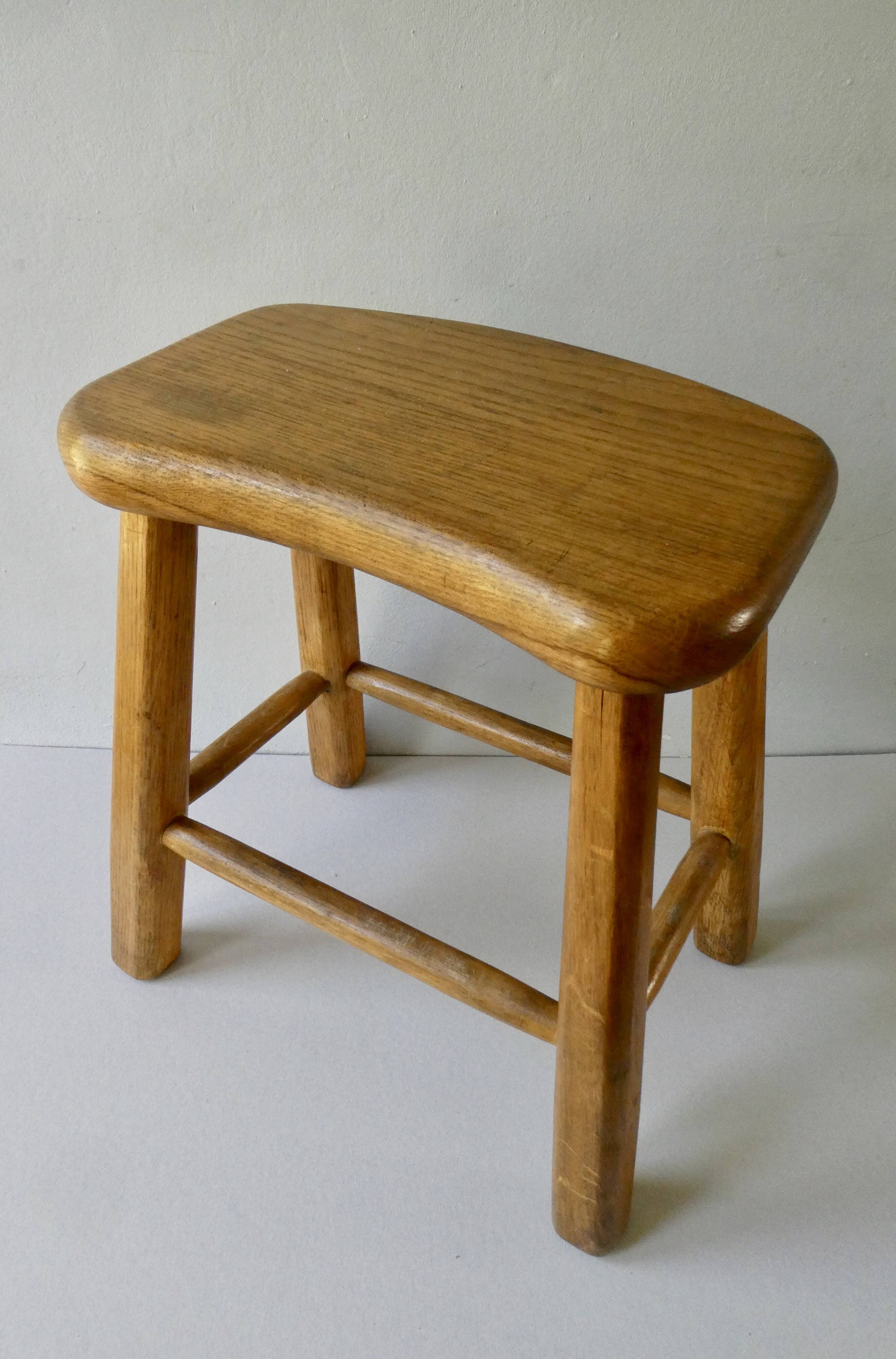 Light wood stool, free-form seat