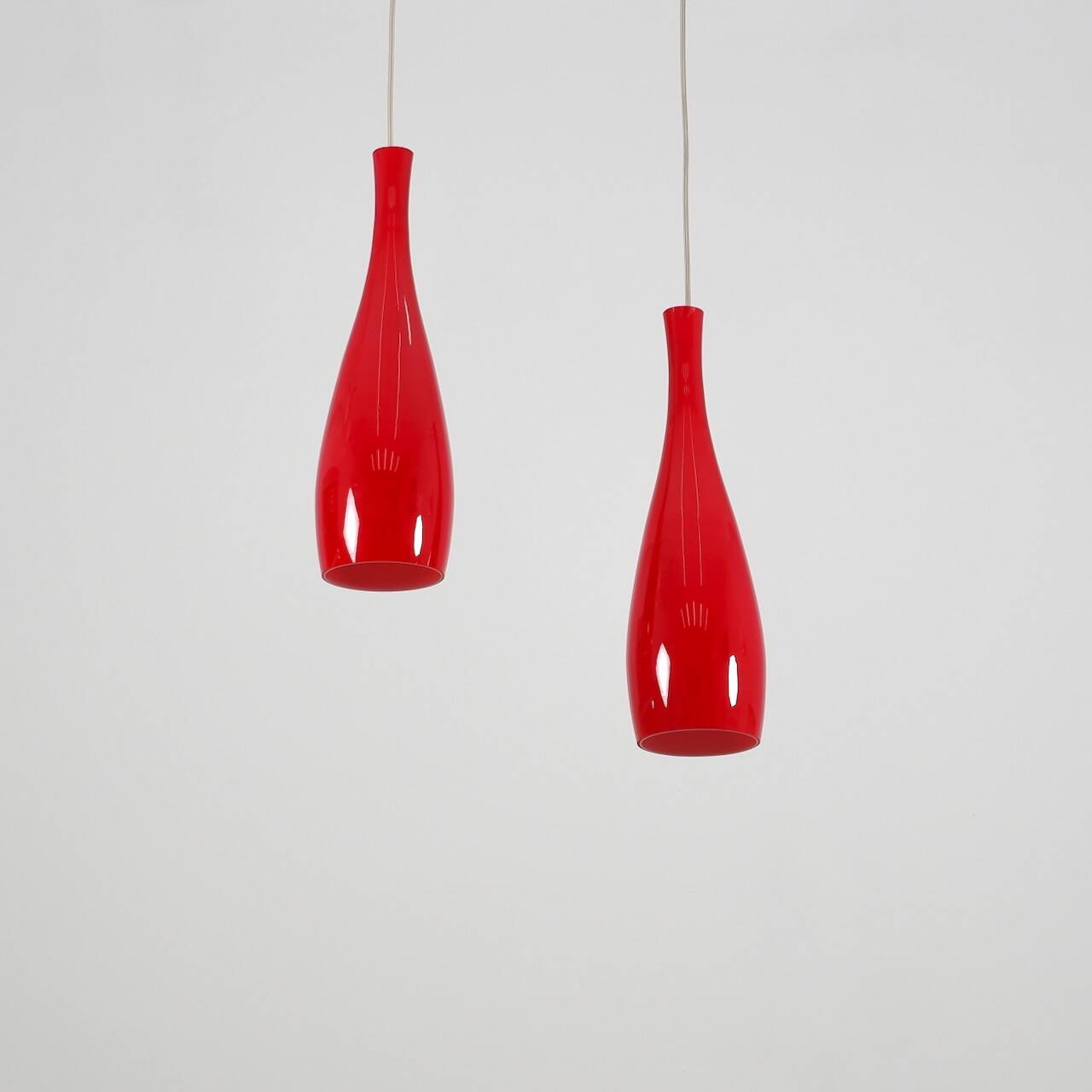 Set of 2 red „Bang“ opal glass pendant lamps by Jacob Bang for Fog & Morup