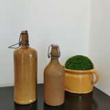 Set of 2 bottles in stoneware, organic decoration