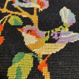 Vintage tapestry framed birds on black background