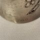 Art Nouveau round silver towel decoration of flowers around 1900