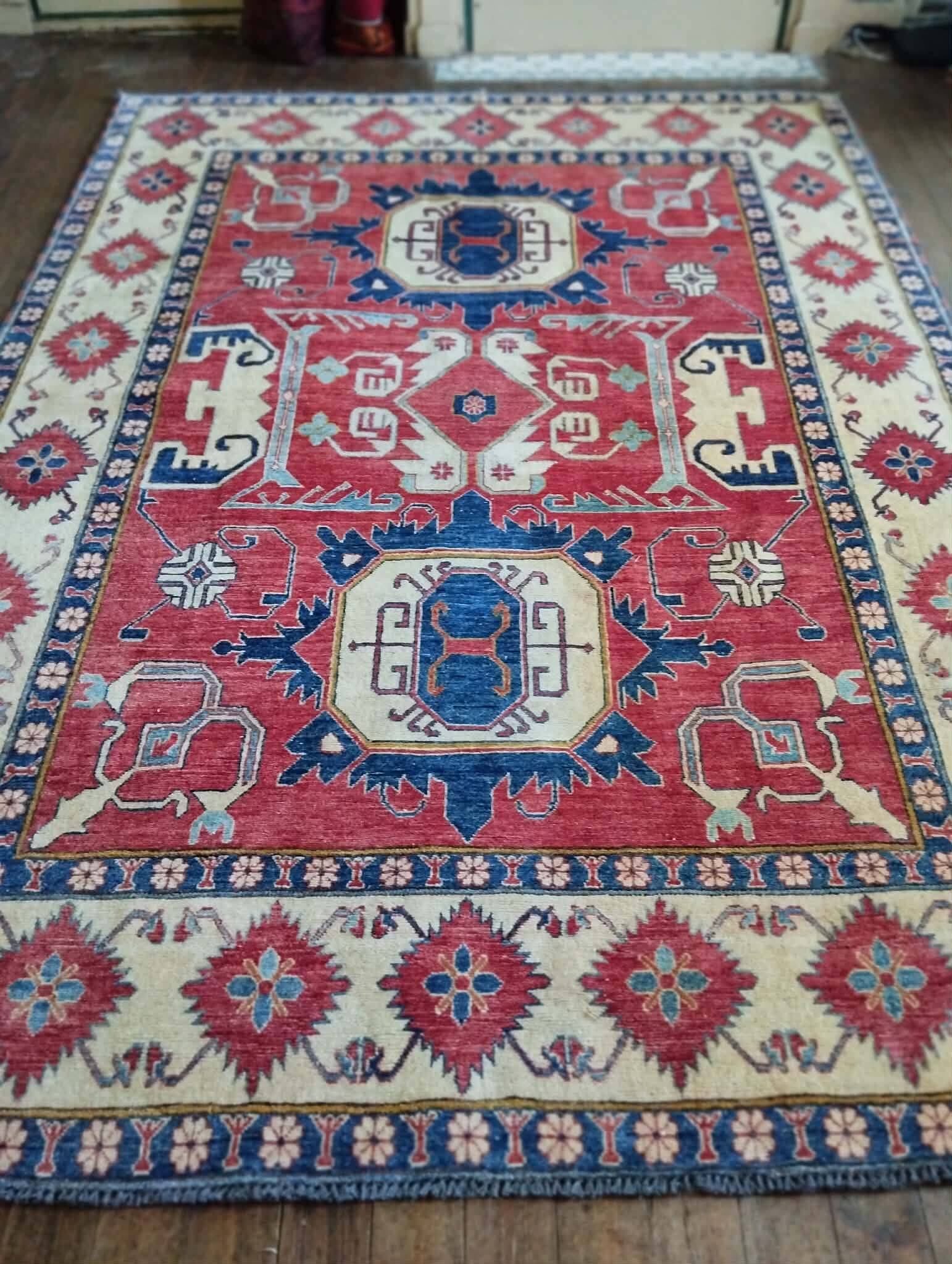 Handmade Pakistani Kazak rug 303x225cm