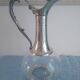 Decanter in pewter and crystal