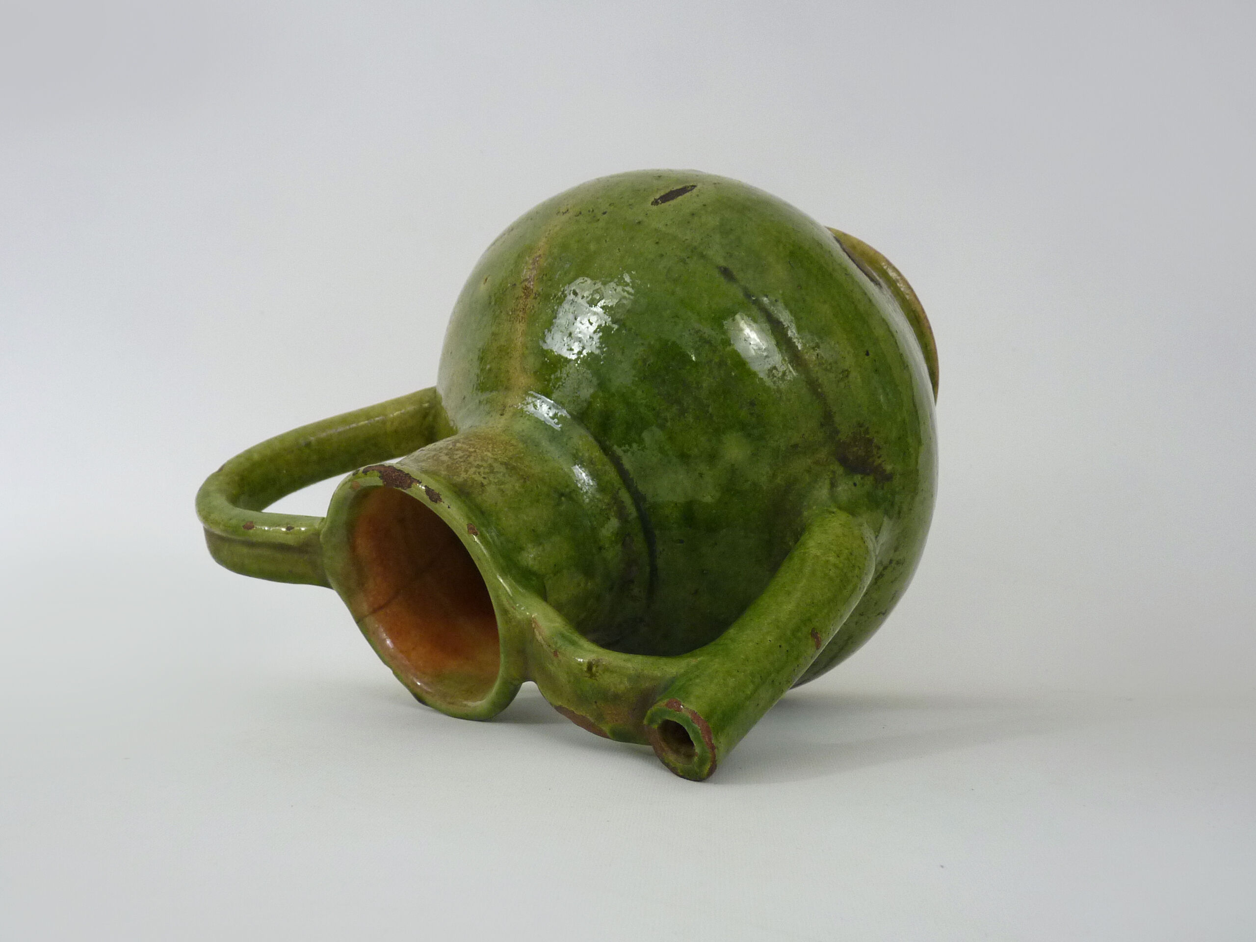 Pitcher pottery in green glazed terracotta, south west of France. XIXth