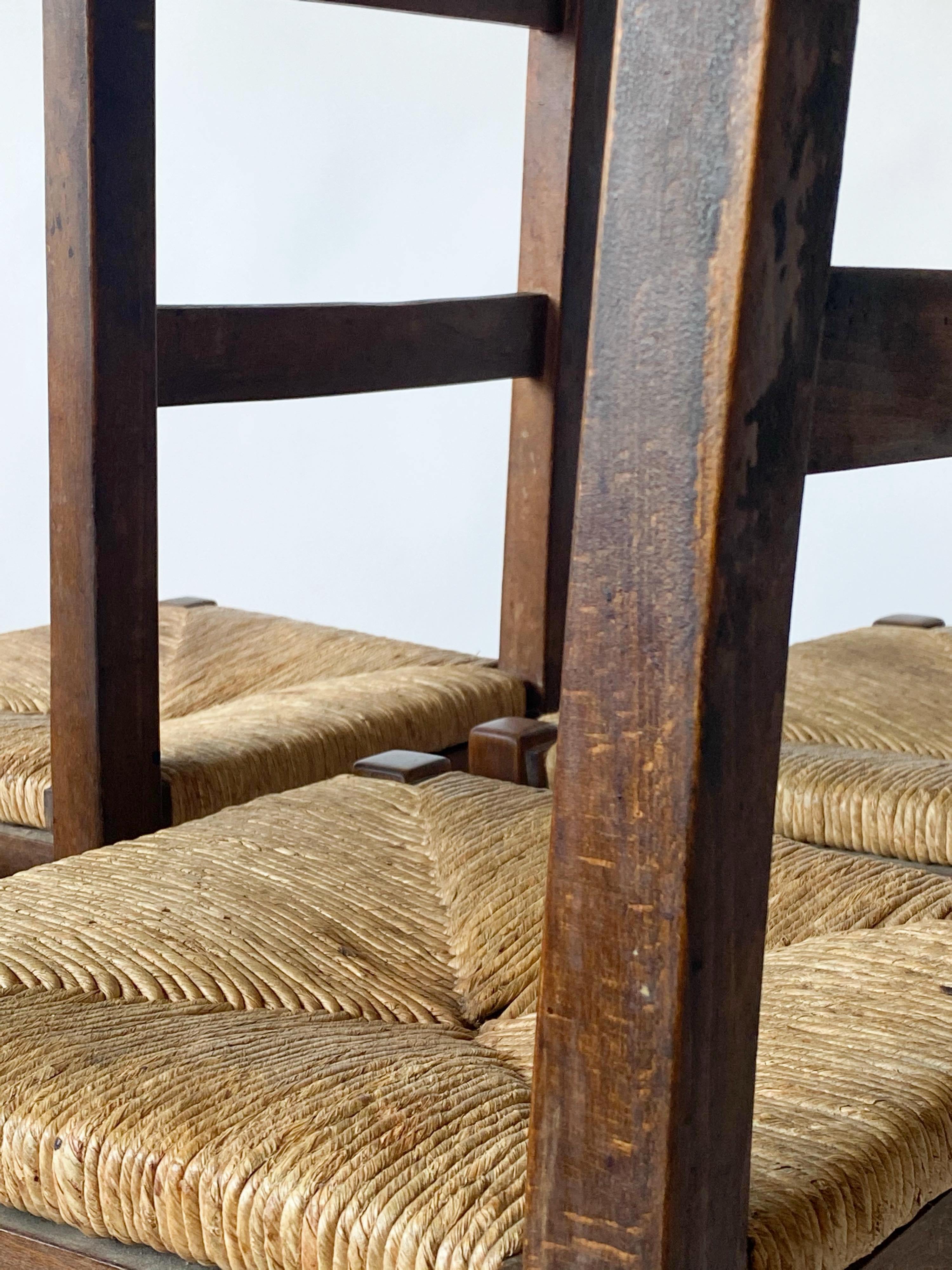 4 wooden and straw country chairs