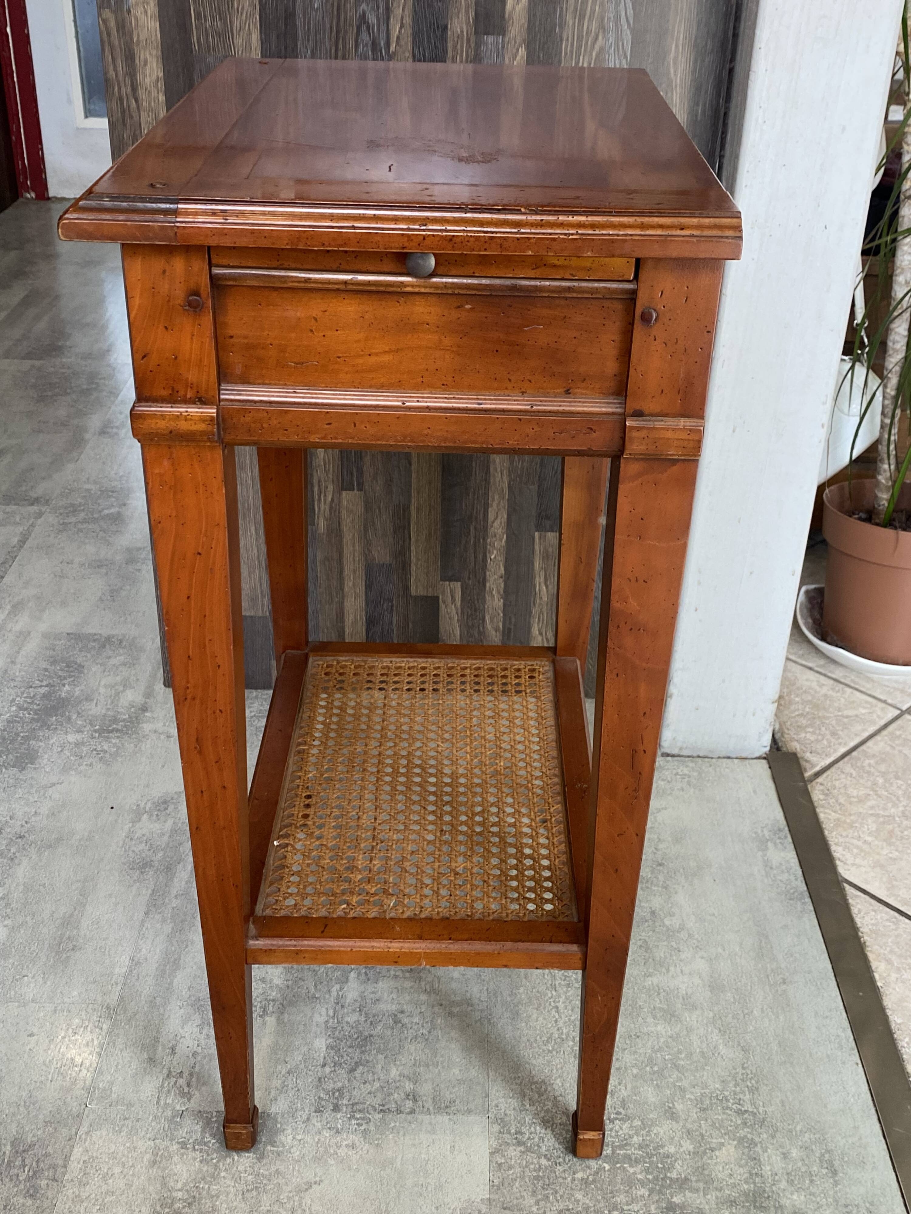 Occasional table in cherry wood, 1 drawer, 1 cane shelf, 1950.